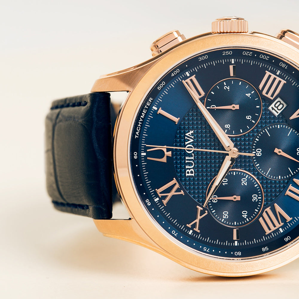 Men's Bulova Classic Chronograph Rose-Tone Strap Watch with Blue Dial (Model: 97B170)