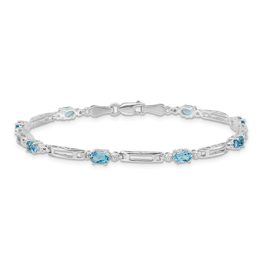 14kt White Gold Diamond and Blue Topaz Bracelet