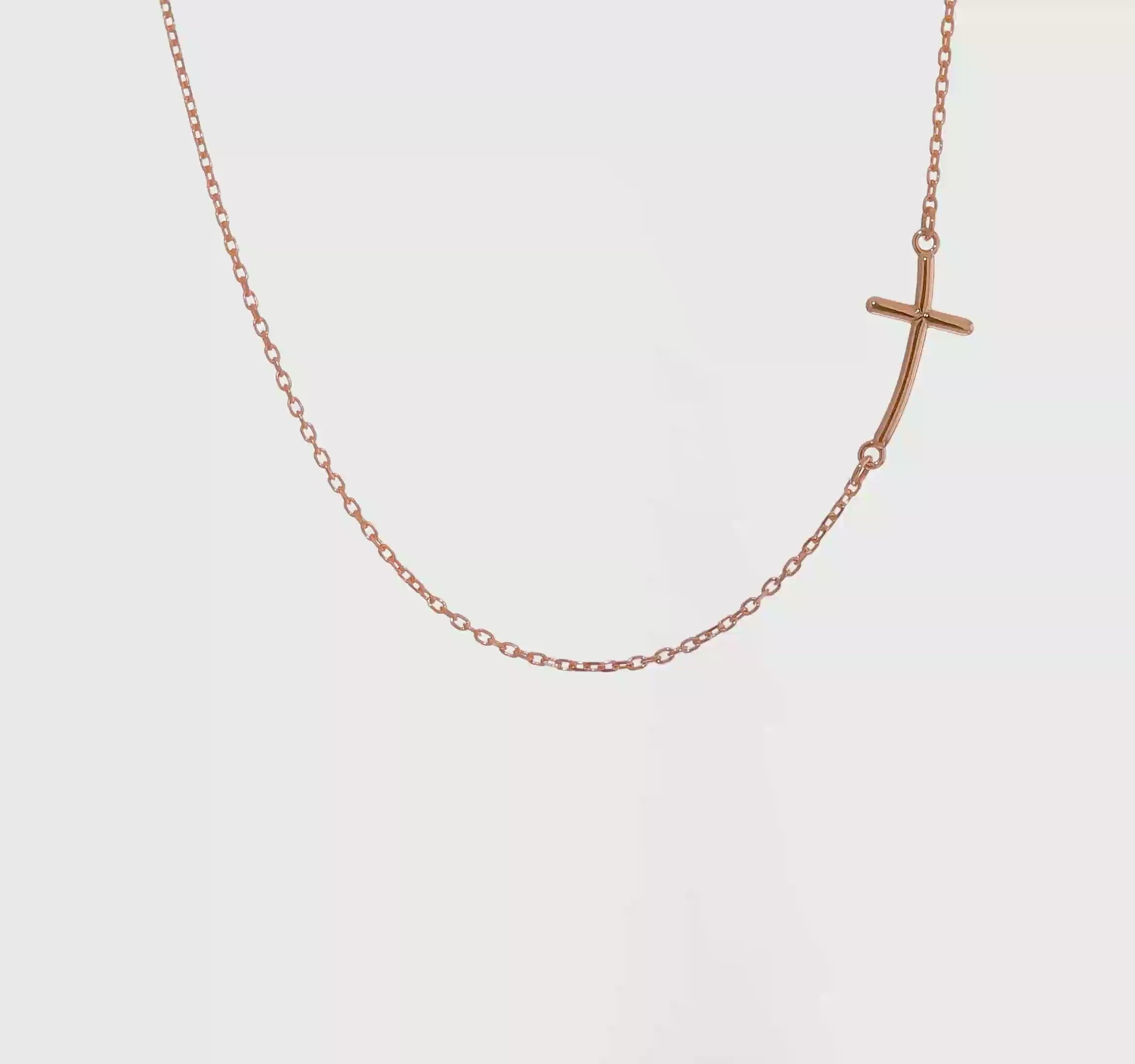 14kt Rose Gold Small Sideways Curved Cross Necklace