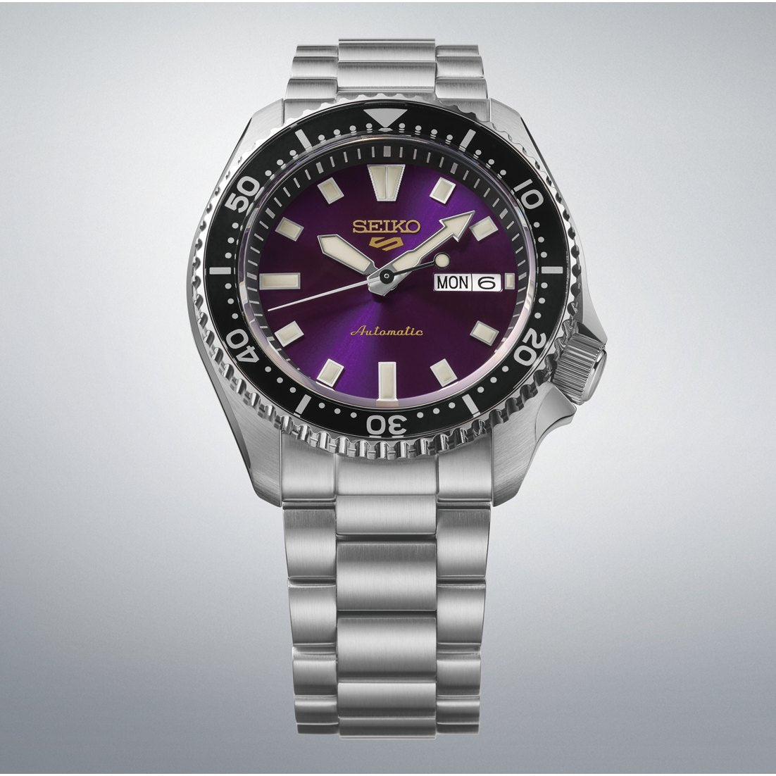 Seiko 5 Sports SKX HDB003 145th anniversary automatic with purple sunray dial, black rotating bezel and three-link stainless steel bracelet